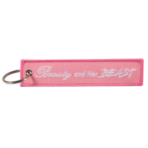 BEAUTY AND HER BEAST - KEYCHAIN